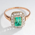 Emerald and diamond cluster ring.