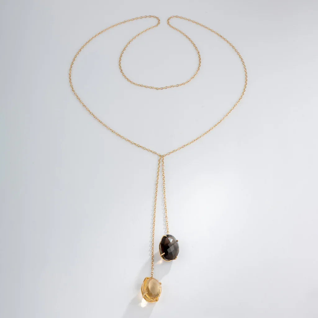 Yellow gold negligee necklace with fine gemstones