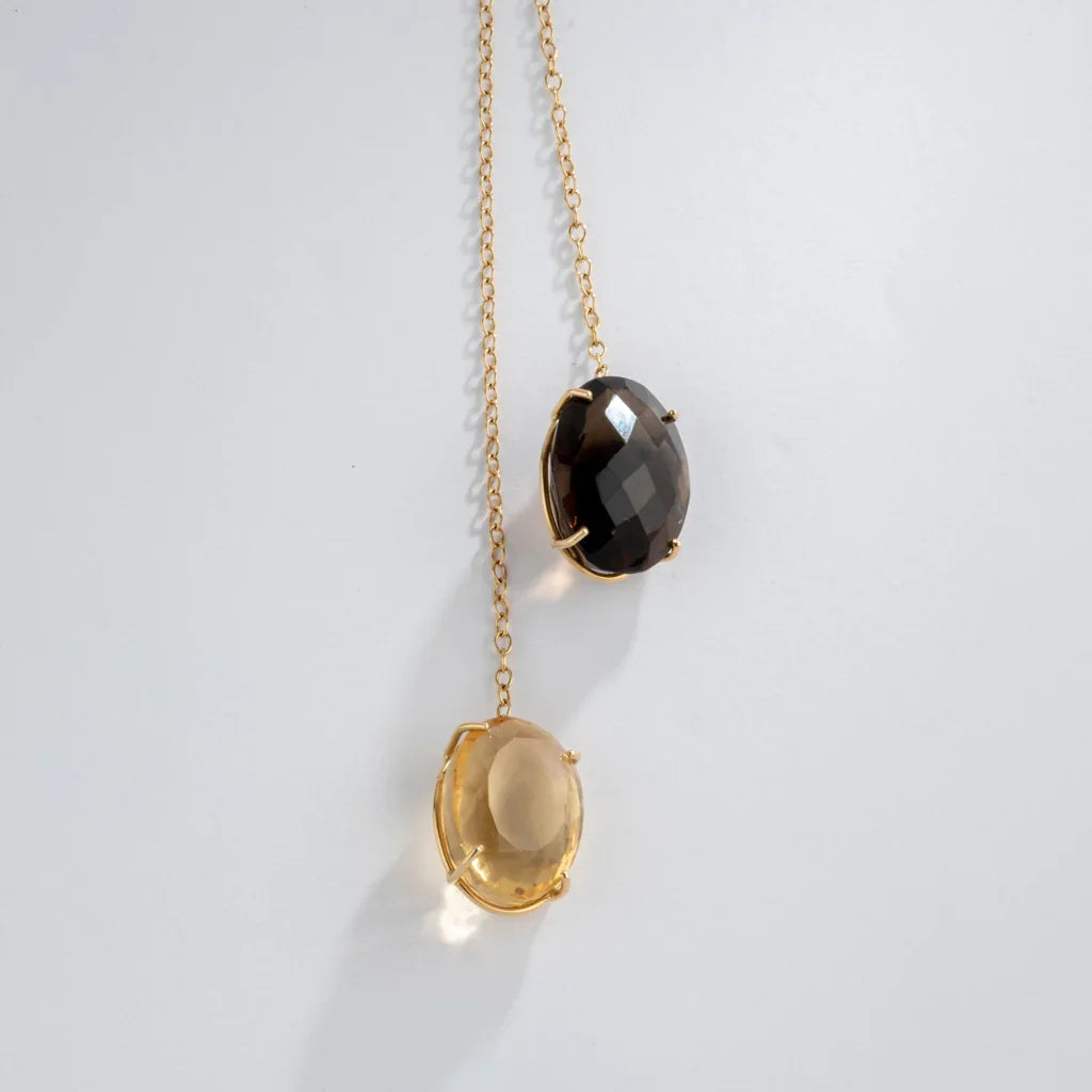Yellow gold negligee necklace with fine gemstones