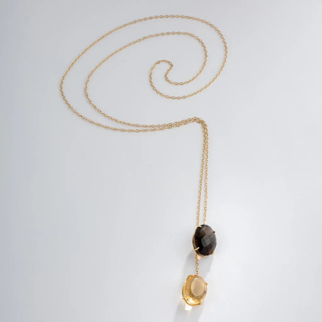 Yellow gold negligee necklace with fine gemstones