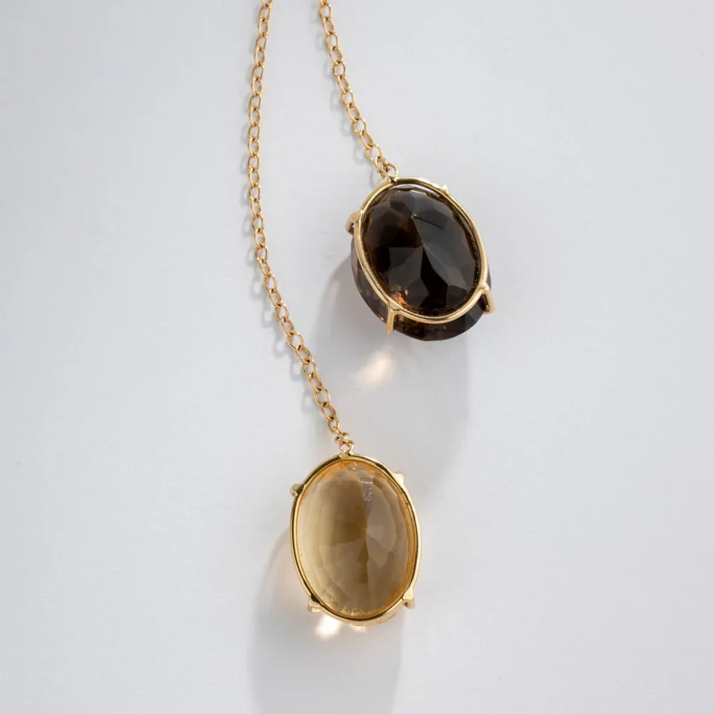 Yellow gold negligee necklace with fine gemstones