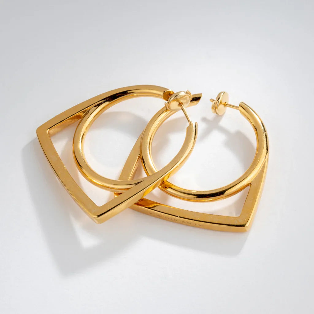 Boucles d'oreille en or jaune de la maison Fred, modèle Success