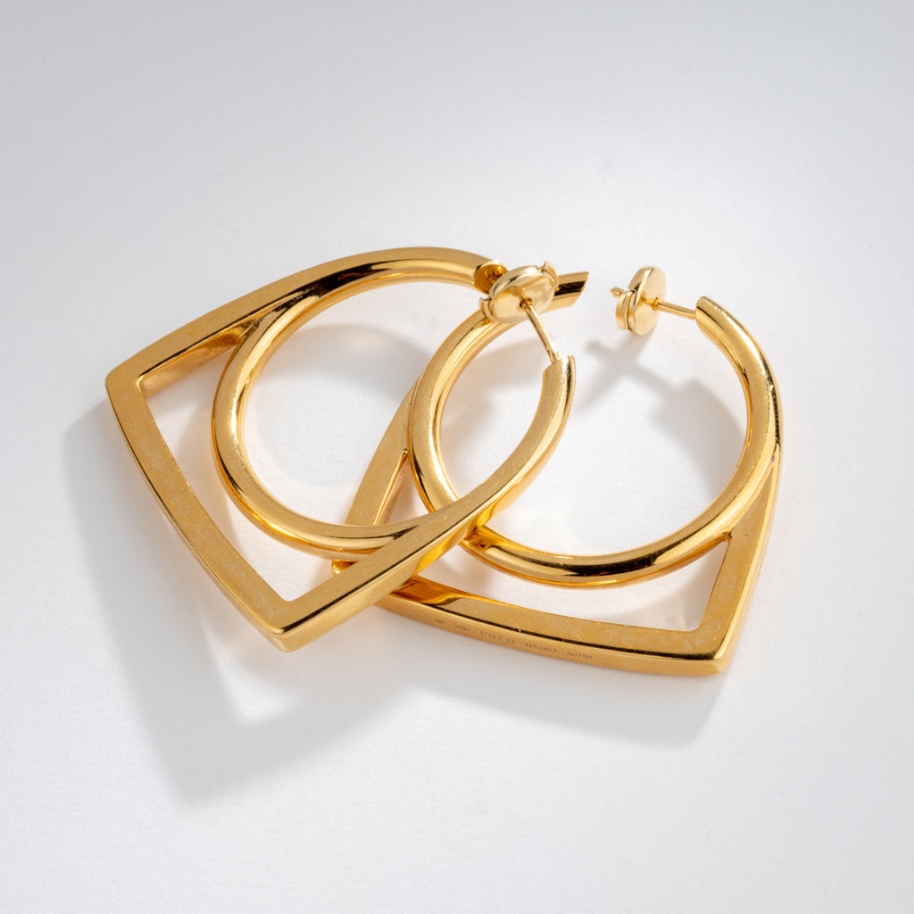Boucles d'oreille en or jaune de la maison Fred, modèle Success