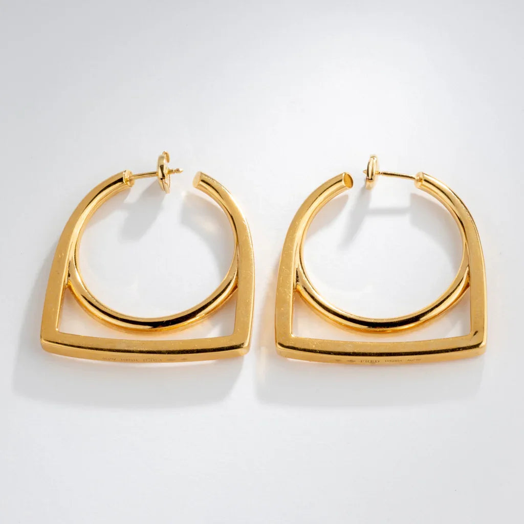 Boucles d'oreille en or jaune de la maison Fred, modèle Success