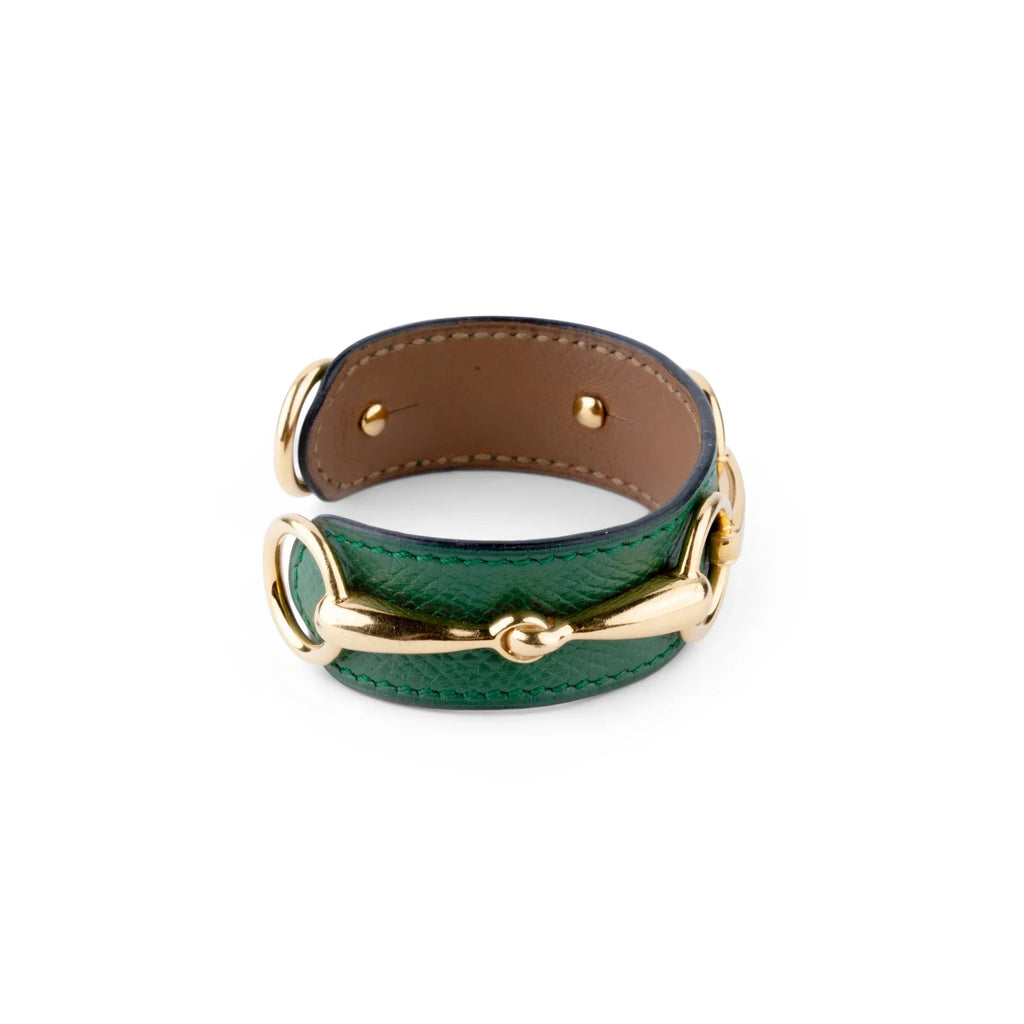 Bracelet de la maison Hermès en cuir et métal doré