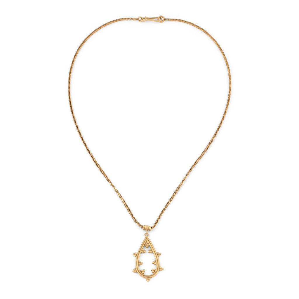 Chaîne en or jaune et pendentif assorti ciselé du créateur grec Zolotas
