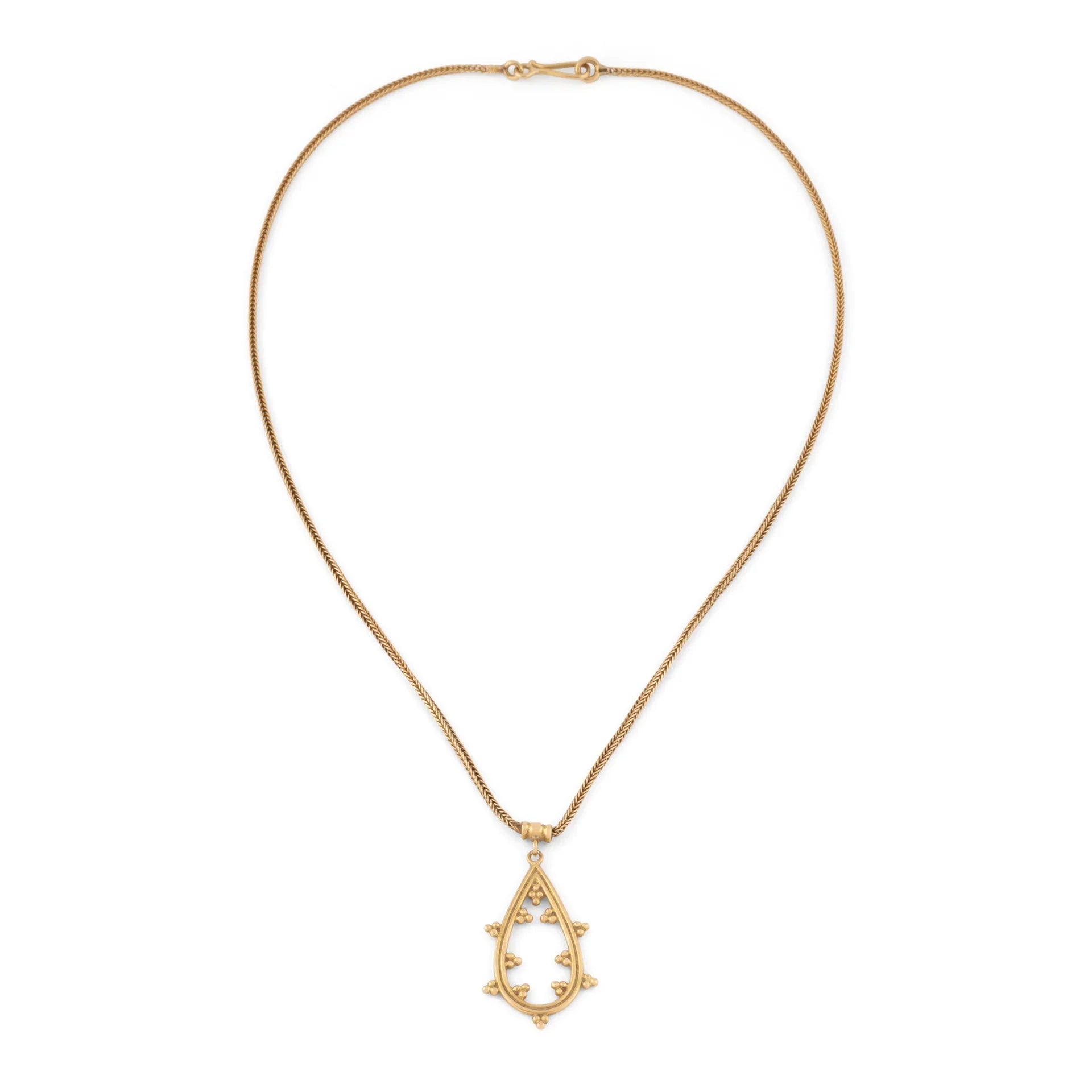 Chaîne en or jaune et pendentif assorti ciselé du créateur grec Zolotas