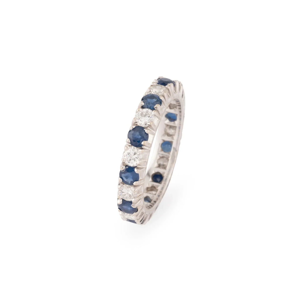 Alliance américaine en or gris,diamant et saphir .