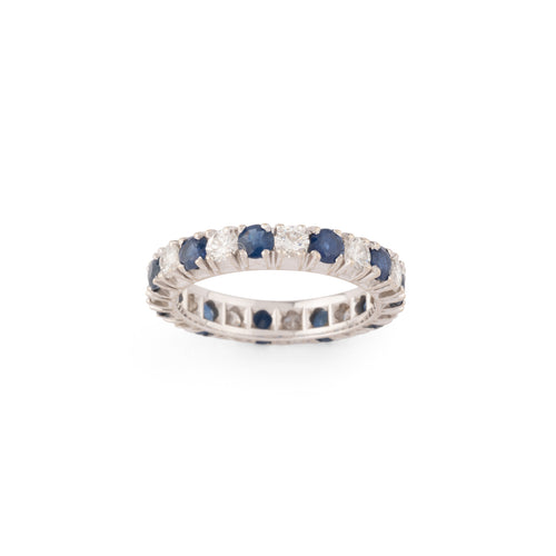 Alliance américaine en or gris,diamant et saphir .