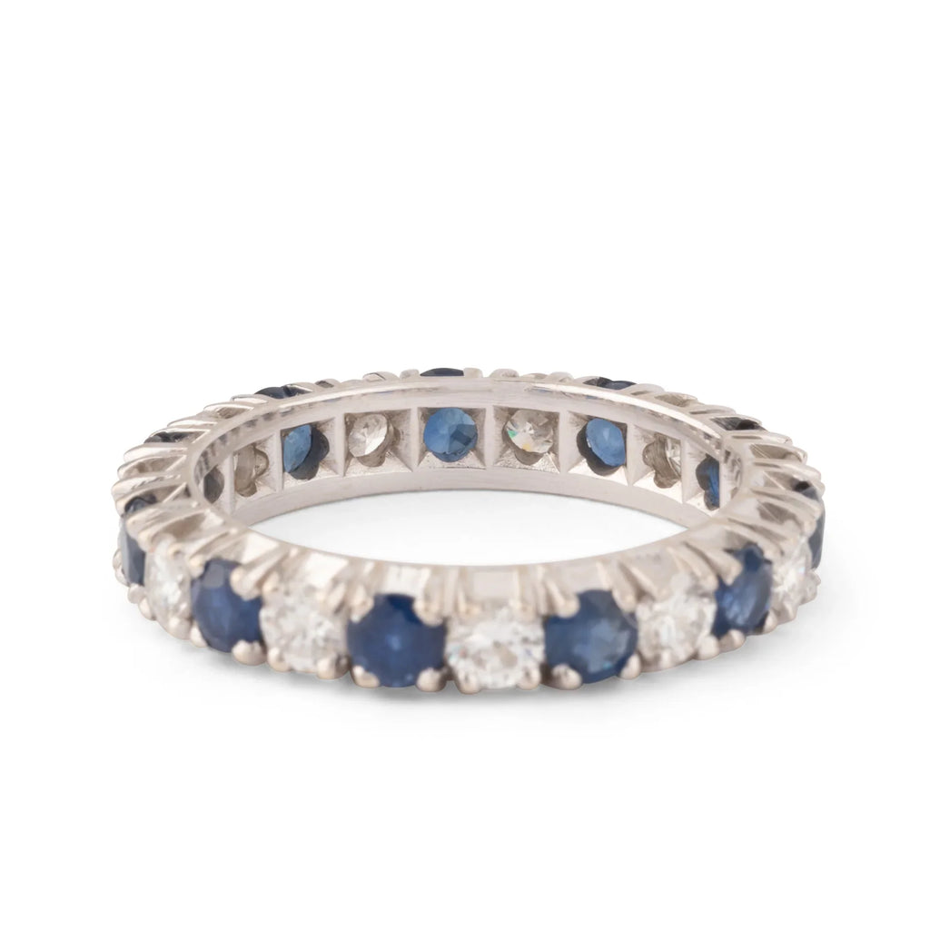 Alliance américaine en or gris,diamant et saphir .