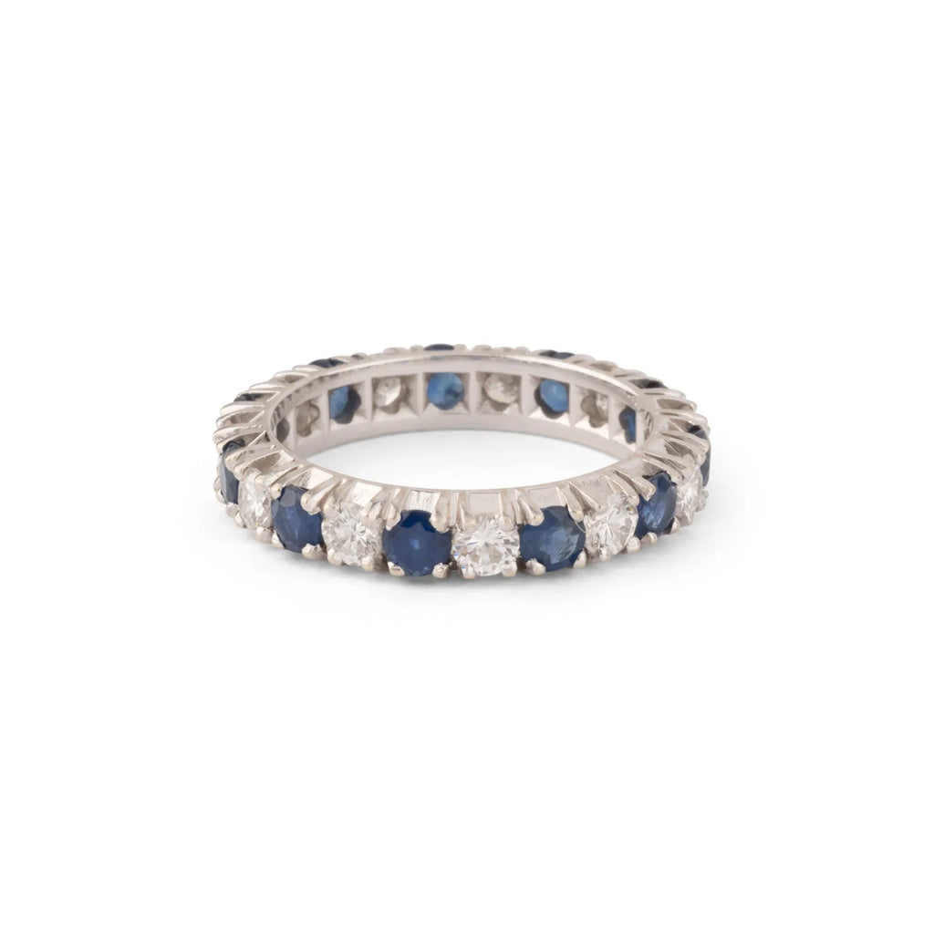 Alliance américaine en or gris,diamant et saphir .