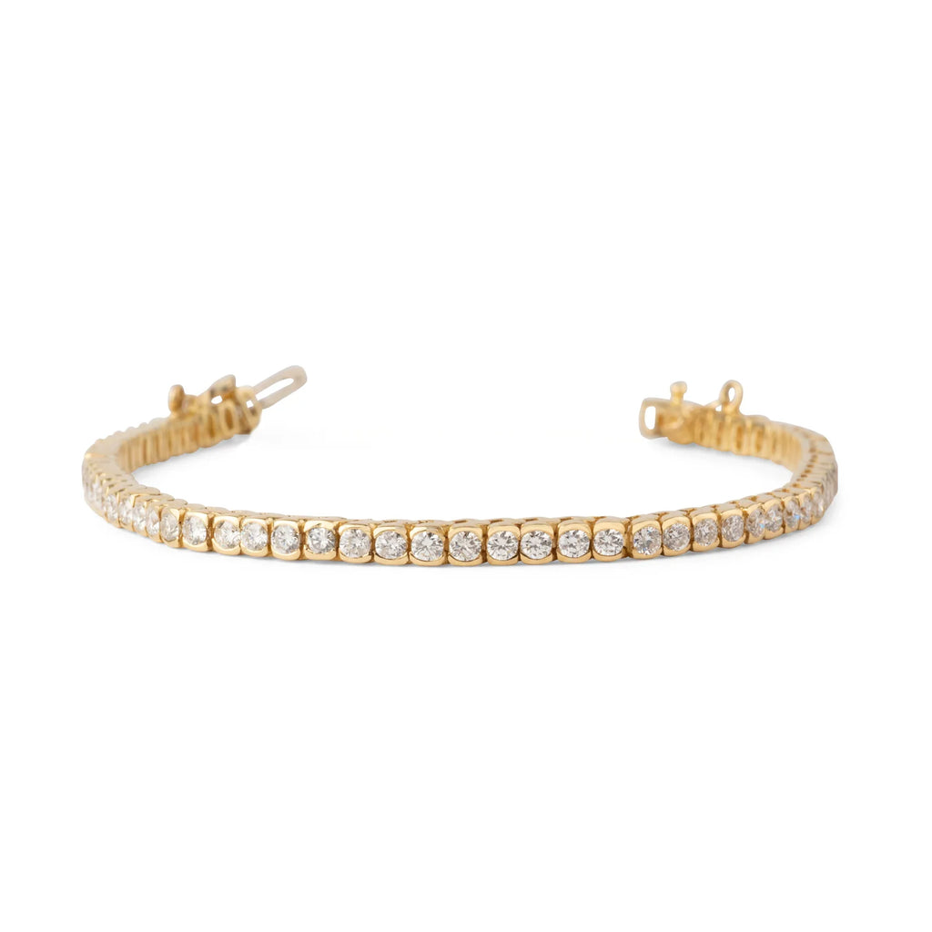 Bracelet riviere en diamant, sur or jaune en serti semi-clos