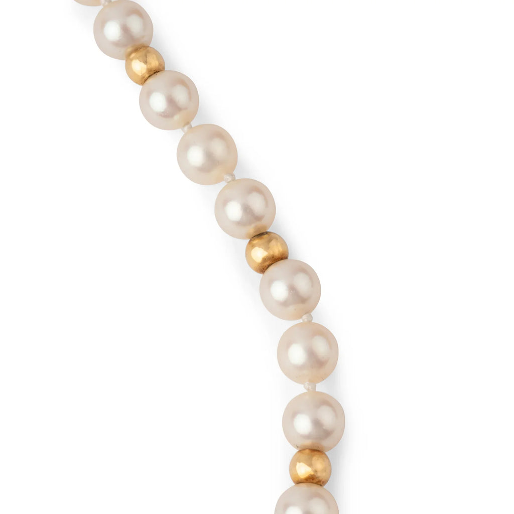 Collier perles Akoya et boule d'or fermoir menottes de la maison Dinh Van