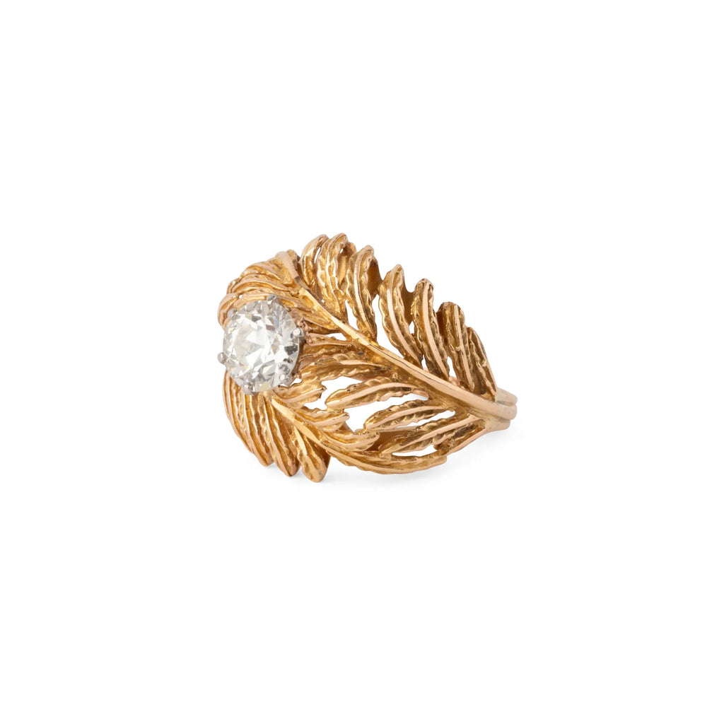 Bague en or jaune en forme de plume ornée d'un solitaire