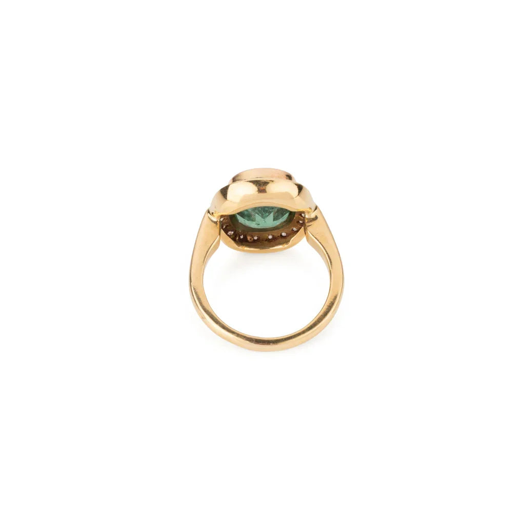 Bague en or jaune ornée d'une émeraude