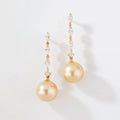 Paire de boucles d'oreilles en or jaune diamants navettes et perles gold des mer du sud