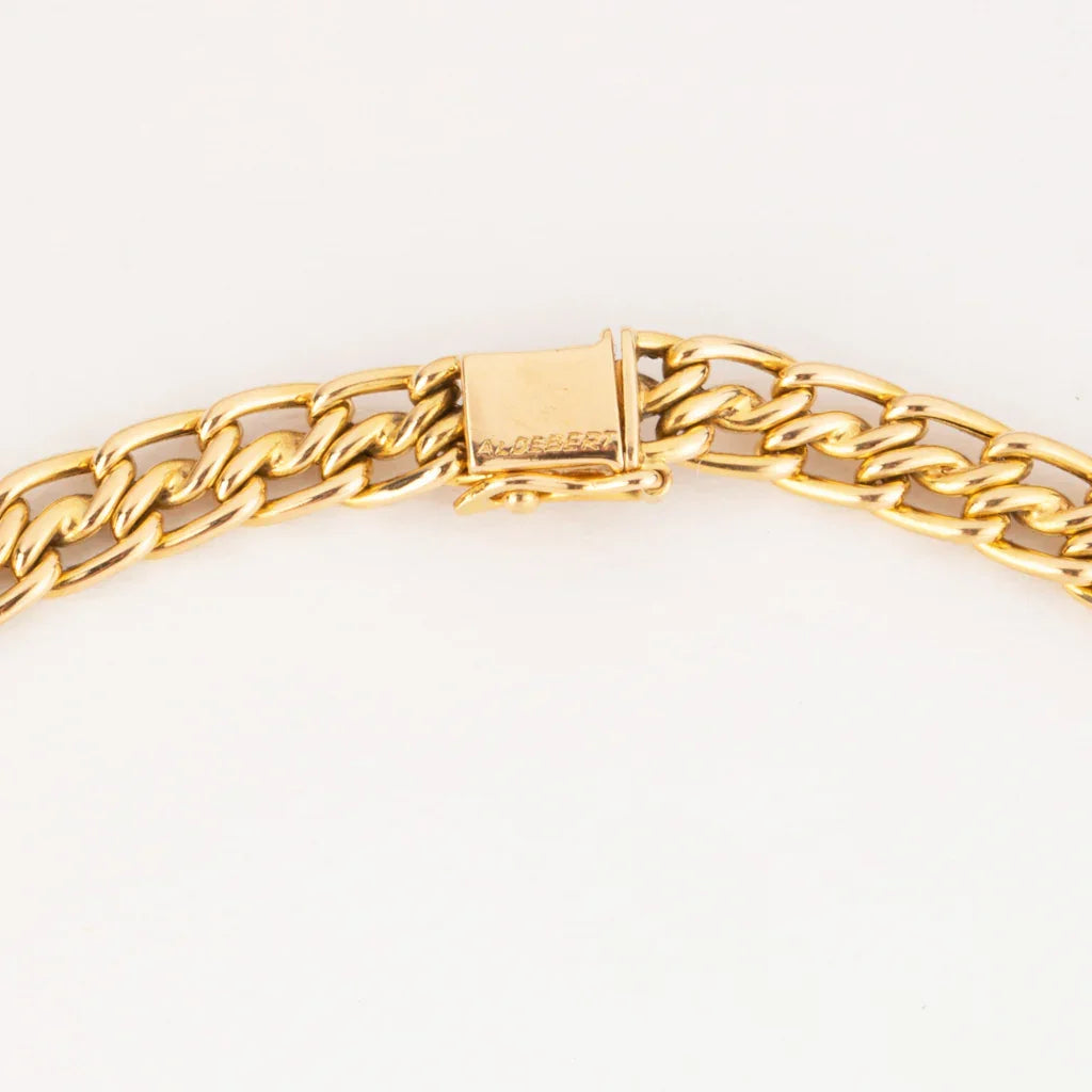 Collier or jaune maille gourmette intercalé de maillon en  diamant