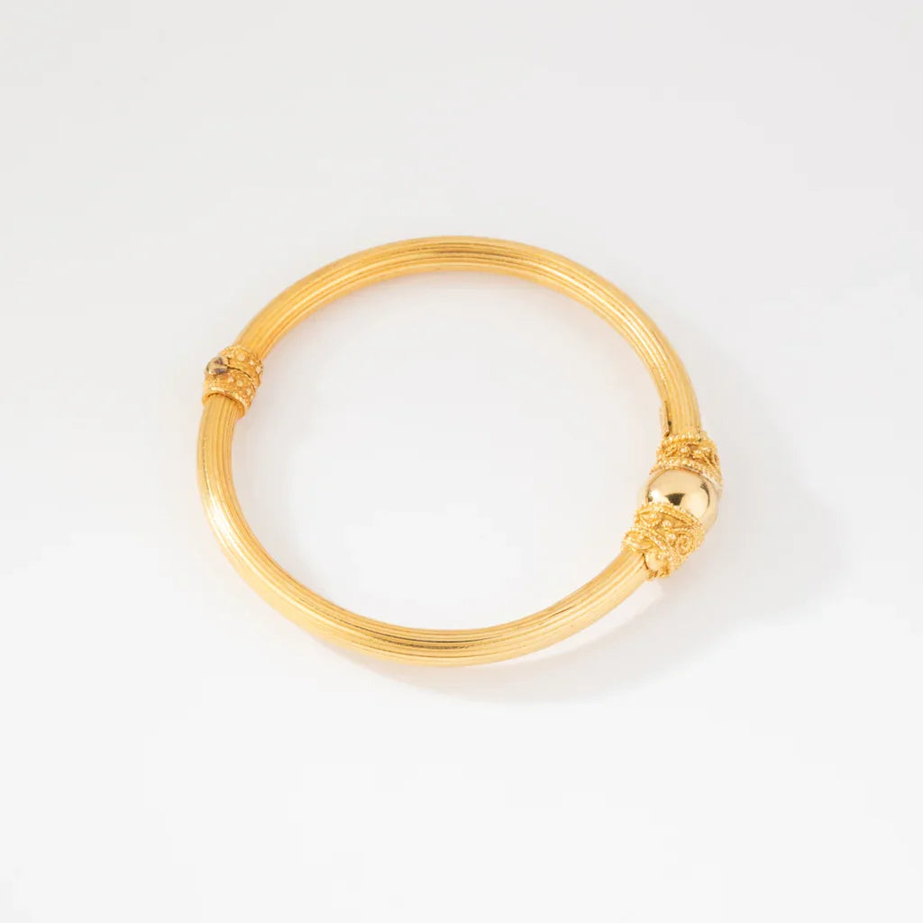 Bracelet jonc en or jaune 22k du créateur Lalaounis