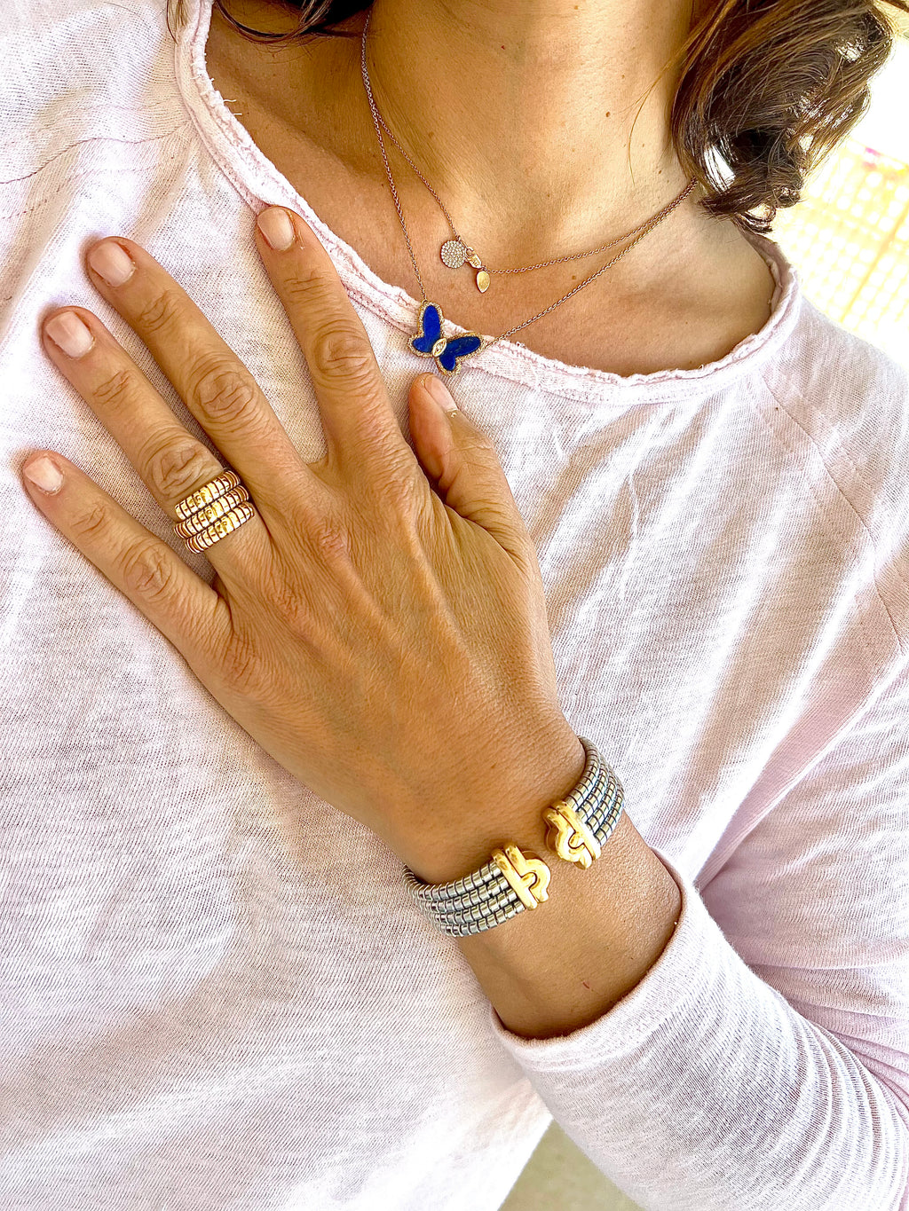 Bracelet de la Maison Bvlgari,collection Parentesi en acier et or jaune