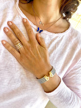 Charger l&#39;image dans la galerie, Bracelet de la Maison Bvlgari,collection Parentesi en acier et or jaune
