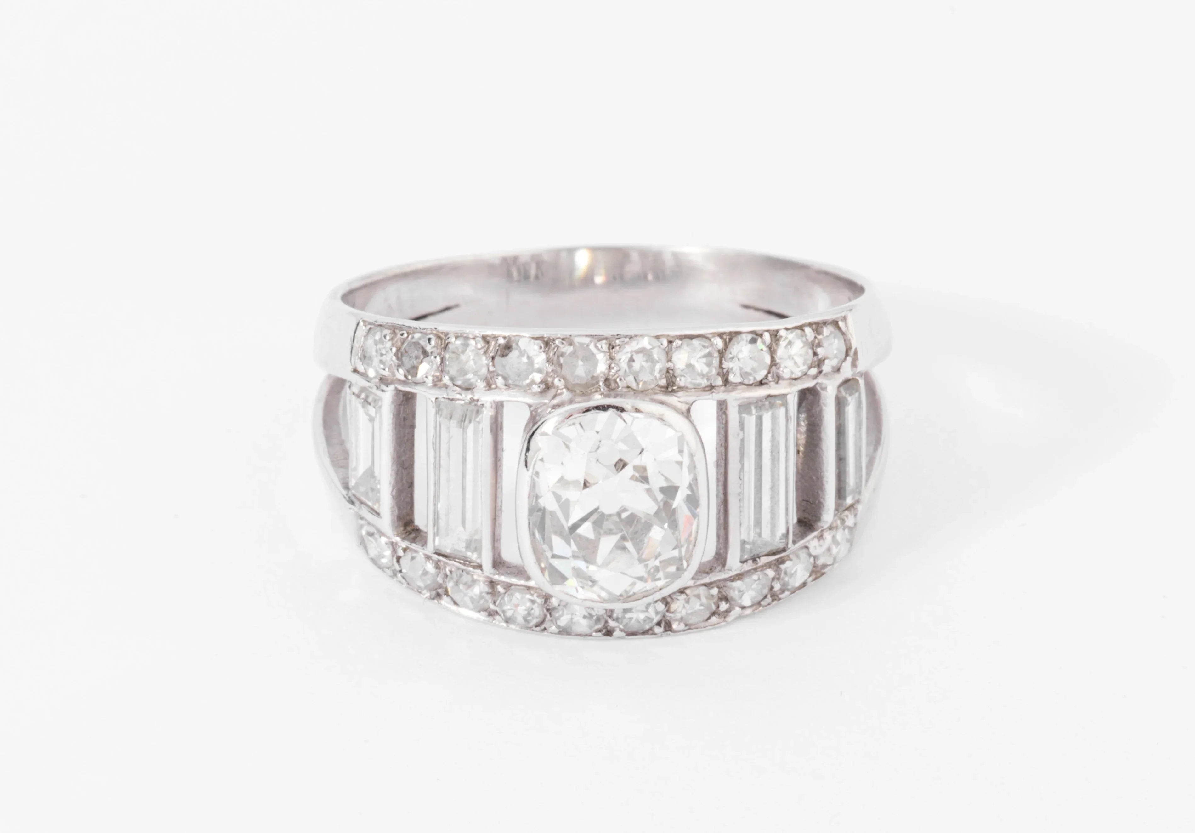 Diamond and platinum band ring
