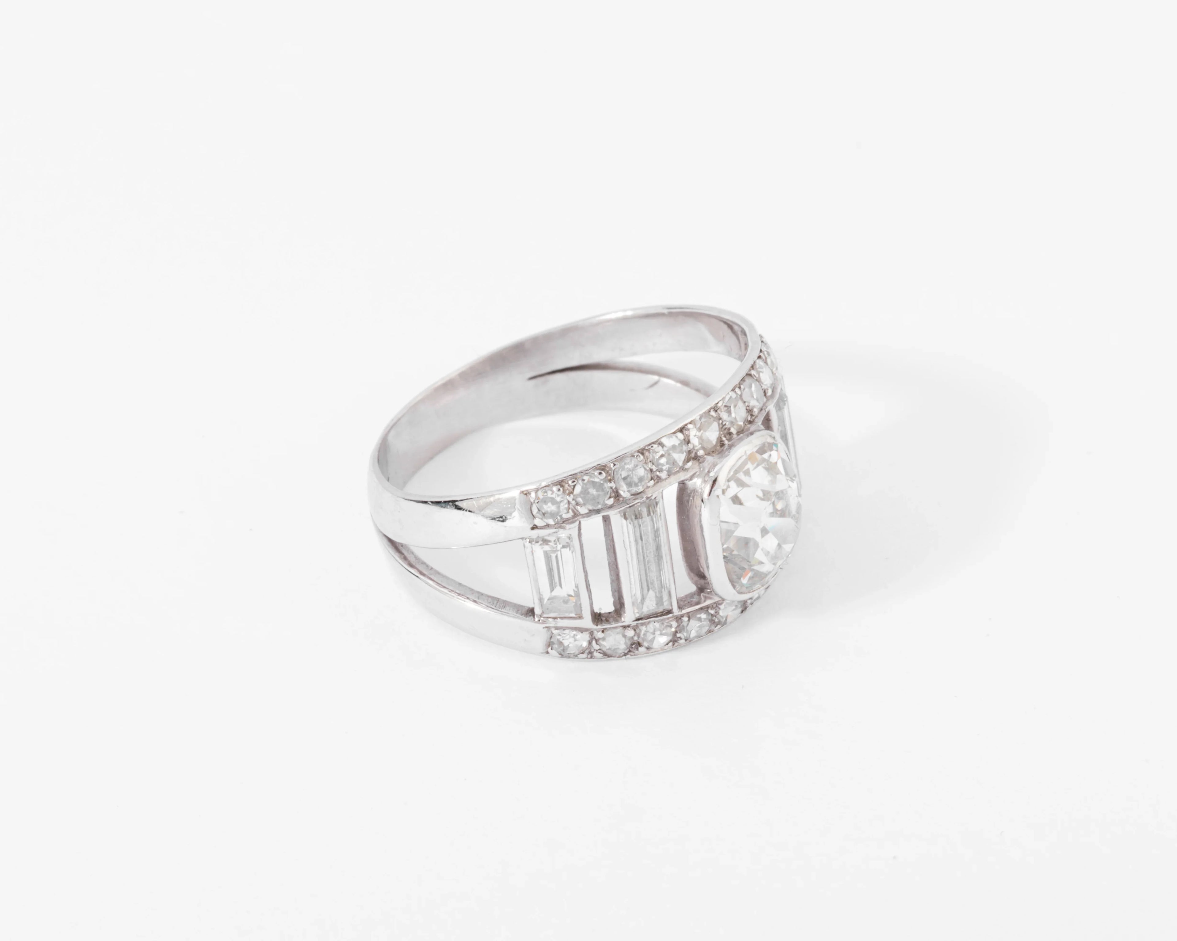 Diamond and platinum band ring