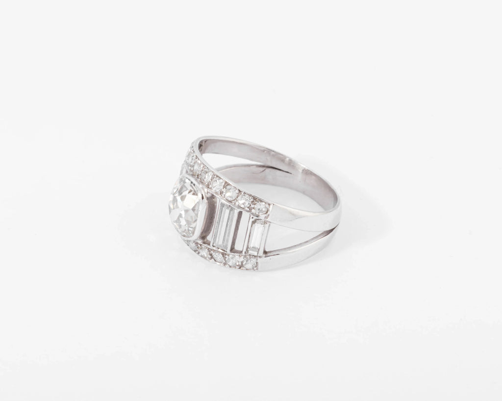 Diamond and platinum band ring