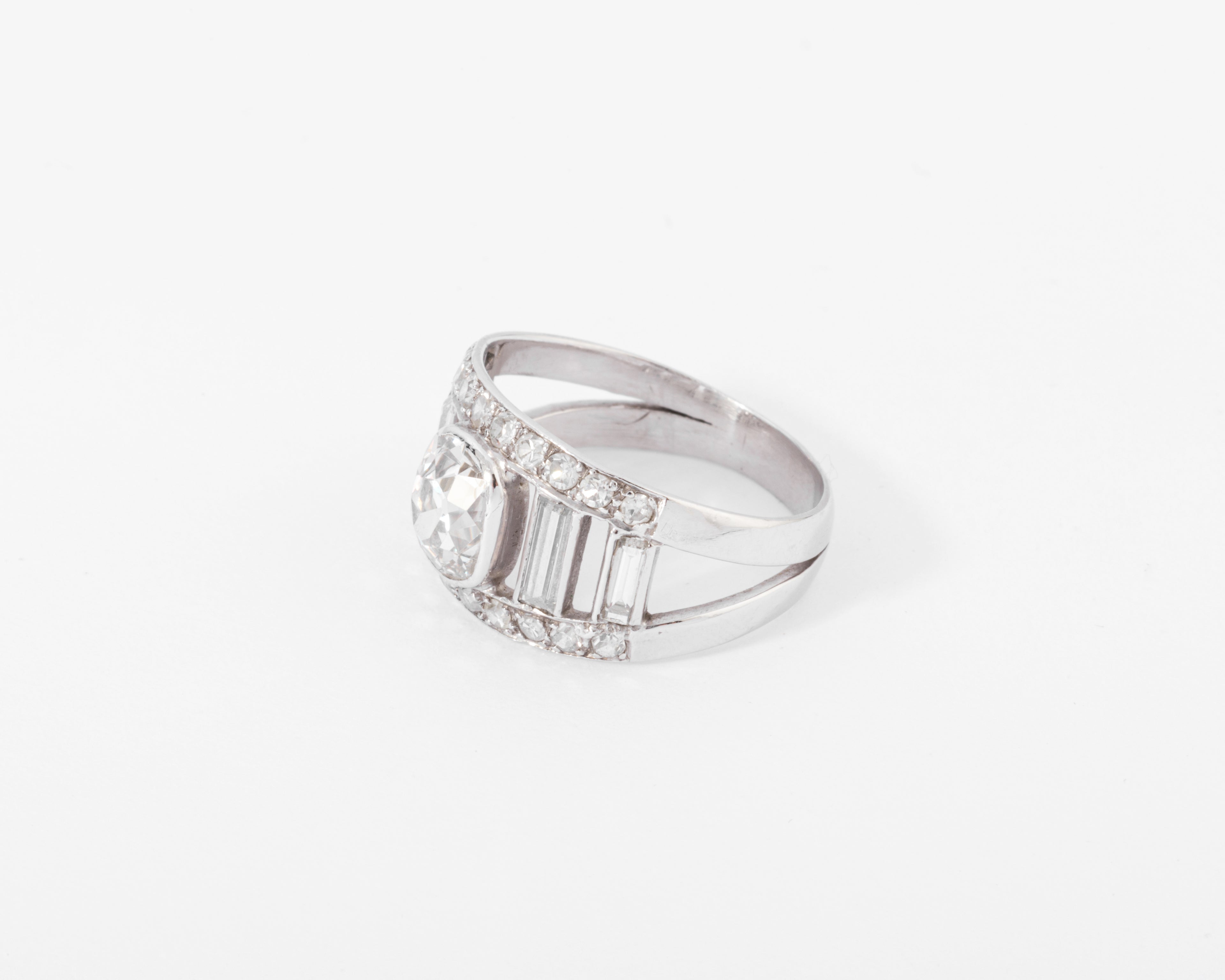 Diamond and platinum band ring