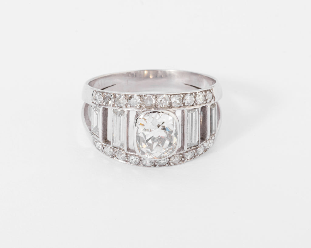 Diamond and platinum band ring