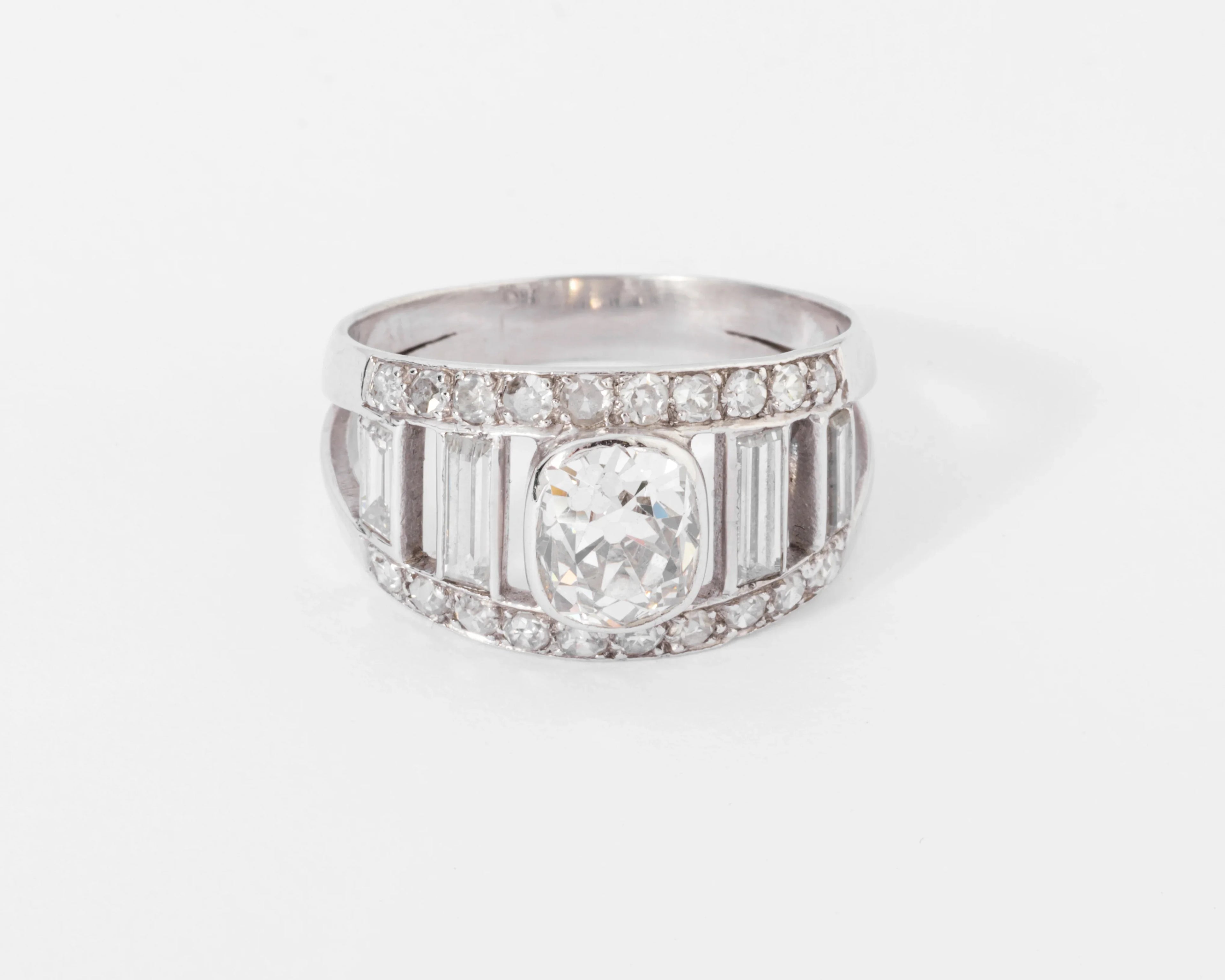 Diamond and platinum band ring