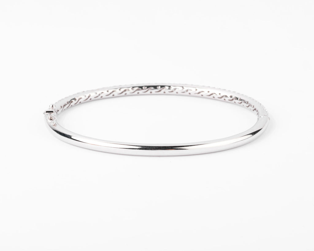 White gold bangle bracelet set with 3 rows of diamonds