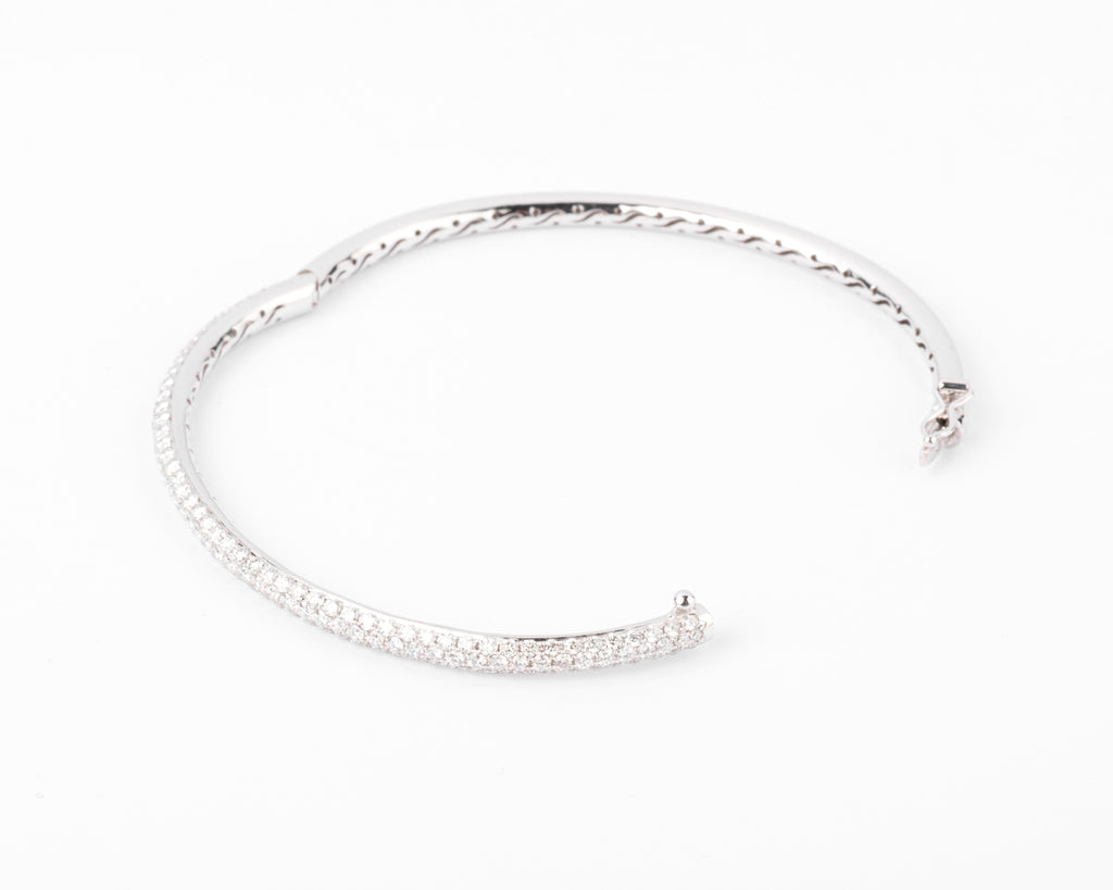 White gold bangle bracelet set with 3 rows of diamonds
