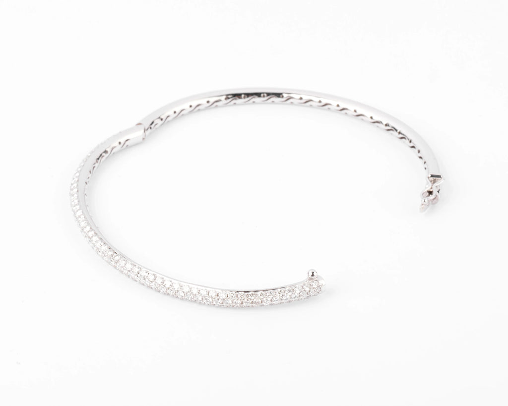 White gold bangle bracelet set with 3 rows of diamonds