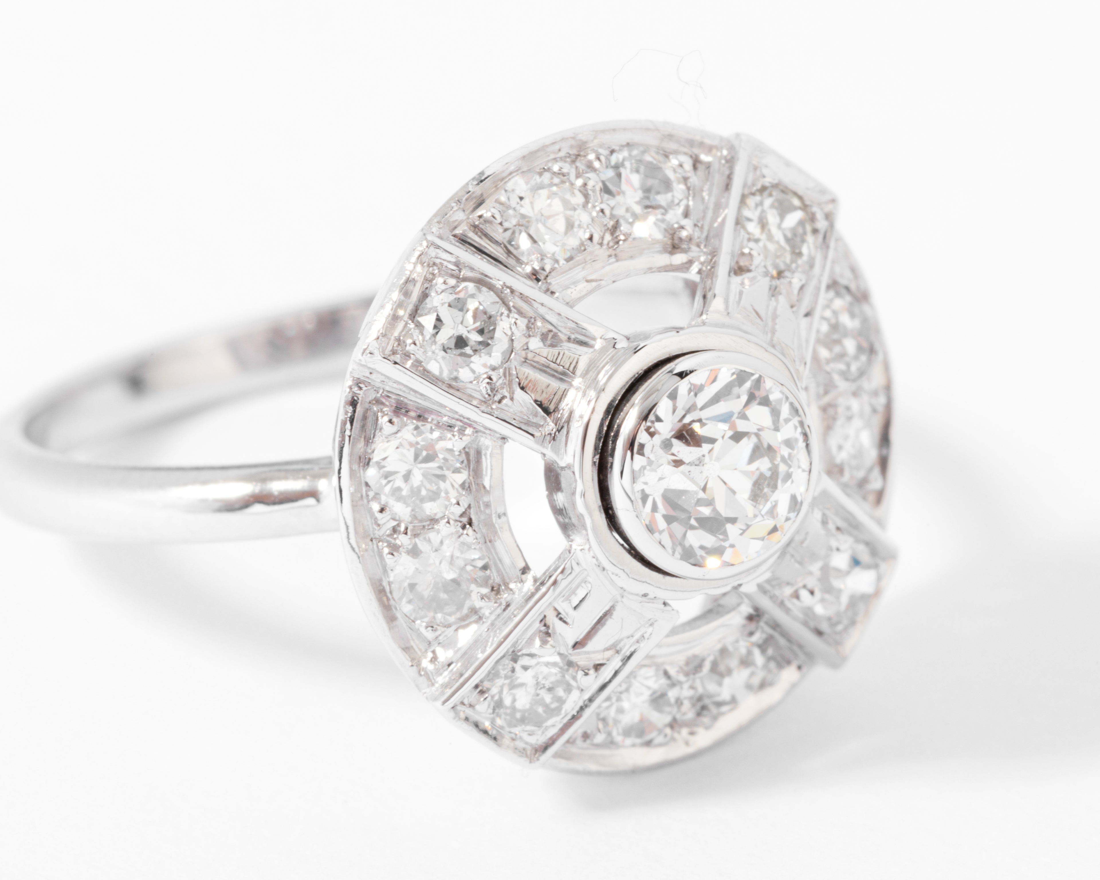 Bague marguerite en platine or gris et diamants