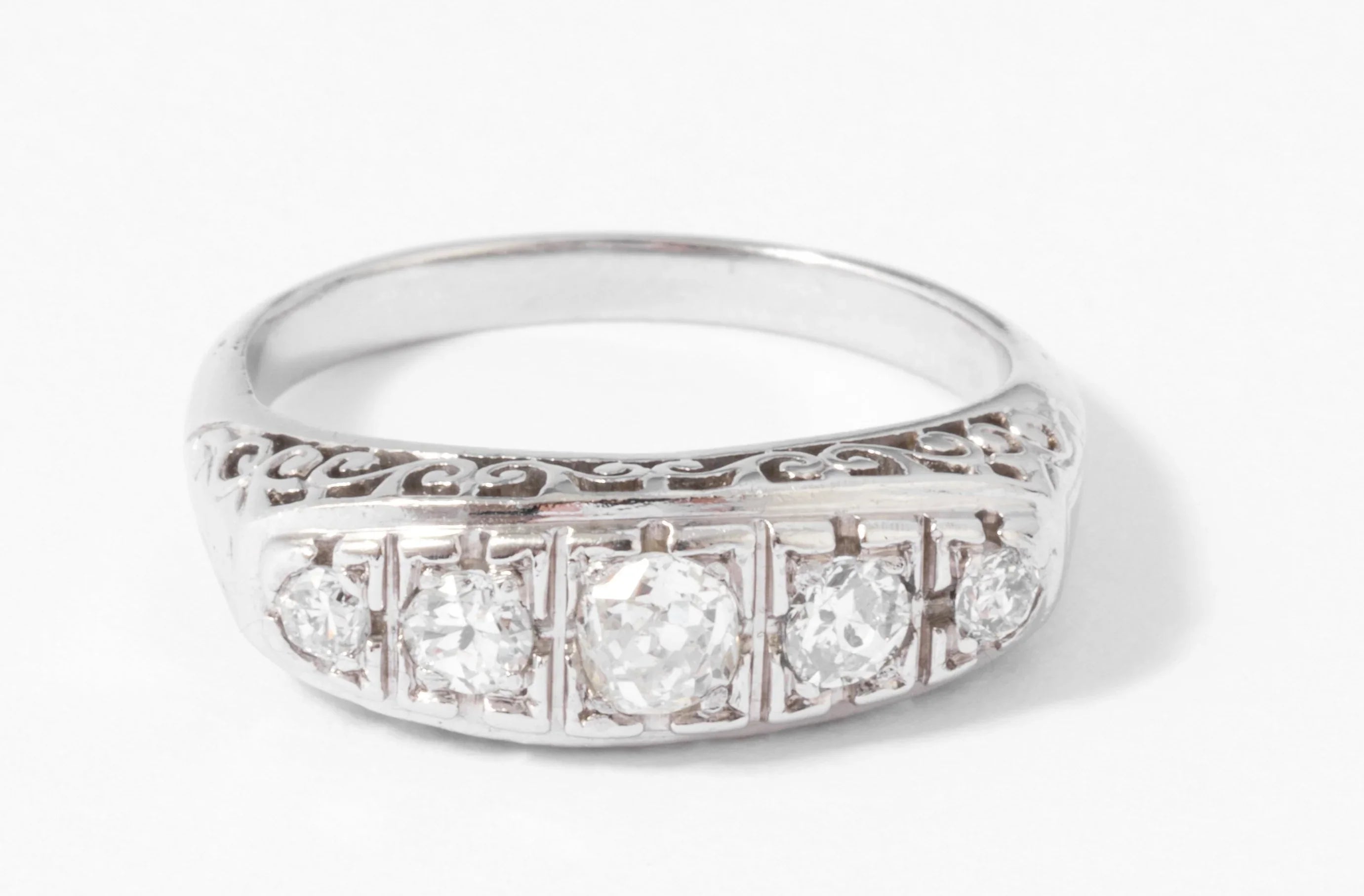Platinum garter ring set with diamonds