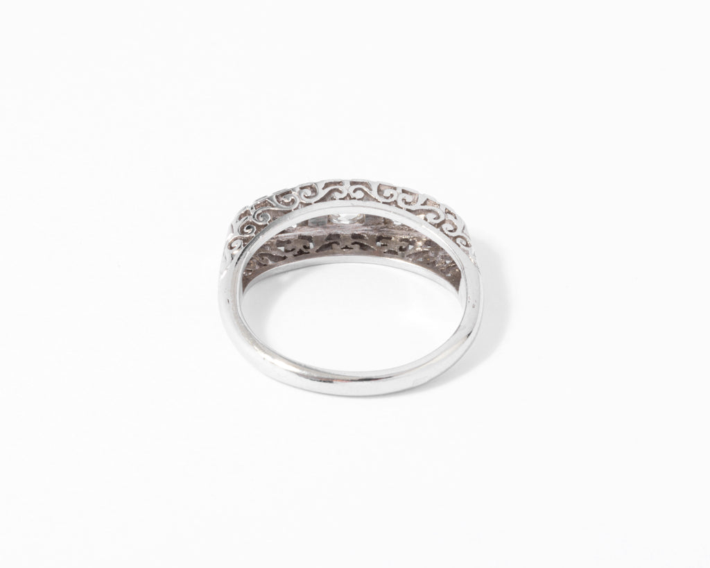 Platinum garter ring set with diamonds