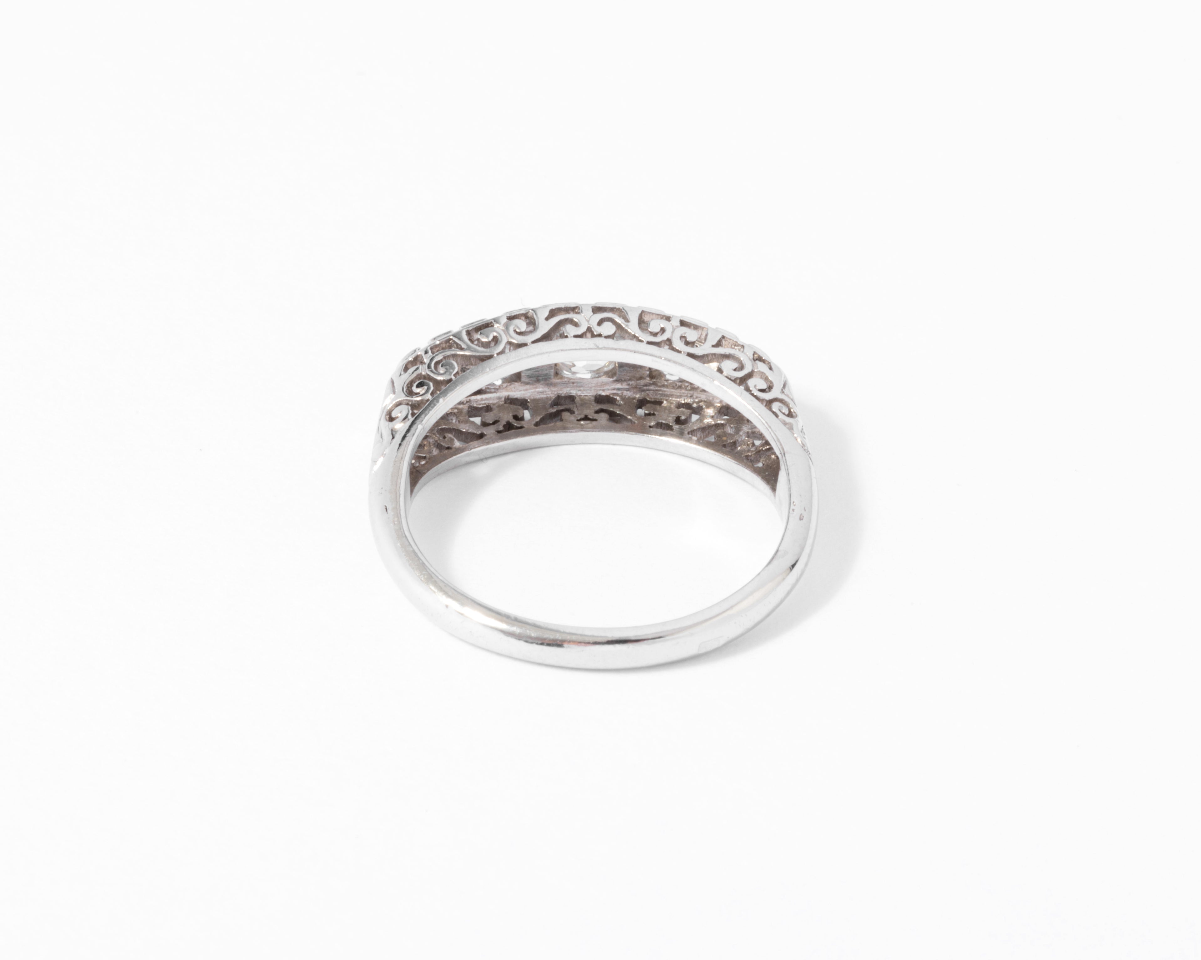 Platinum garter ring set with diamonds