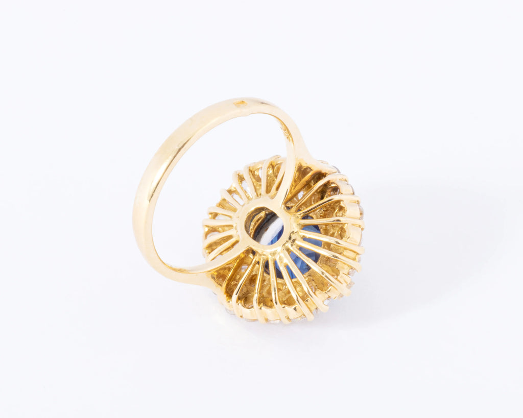 daisy ring in yellow gold with sapphire and double diamond halo