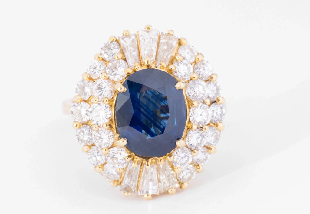 daisy ring in yellow gold with sapphire and double diamond halo