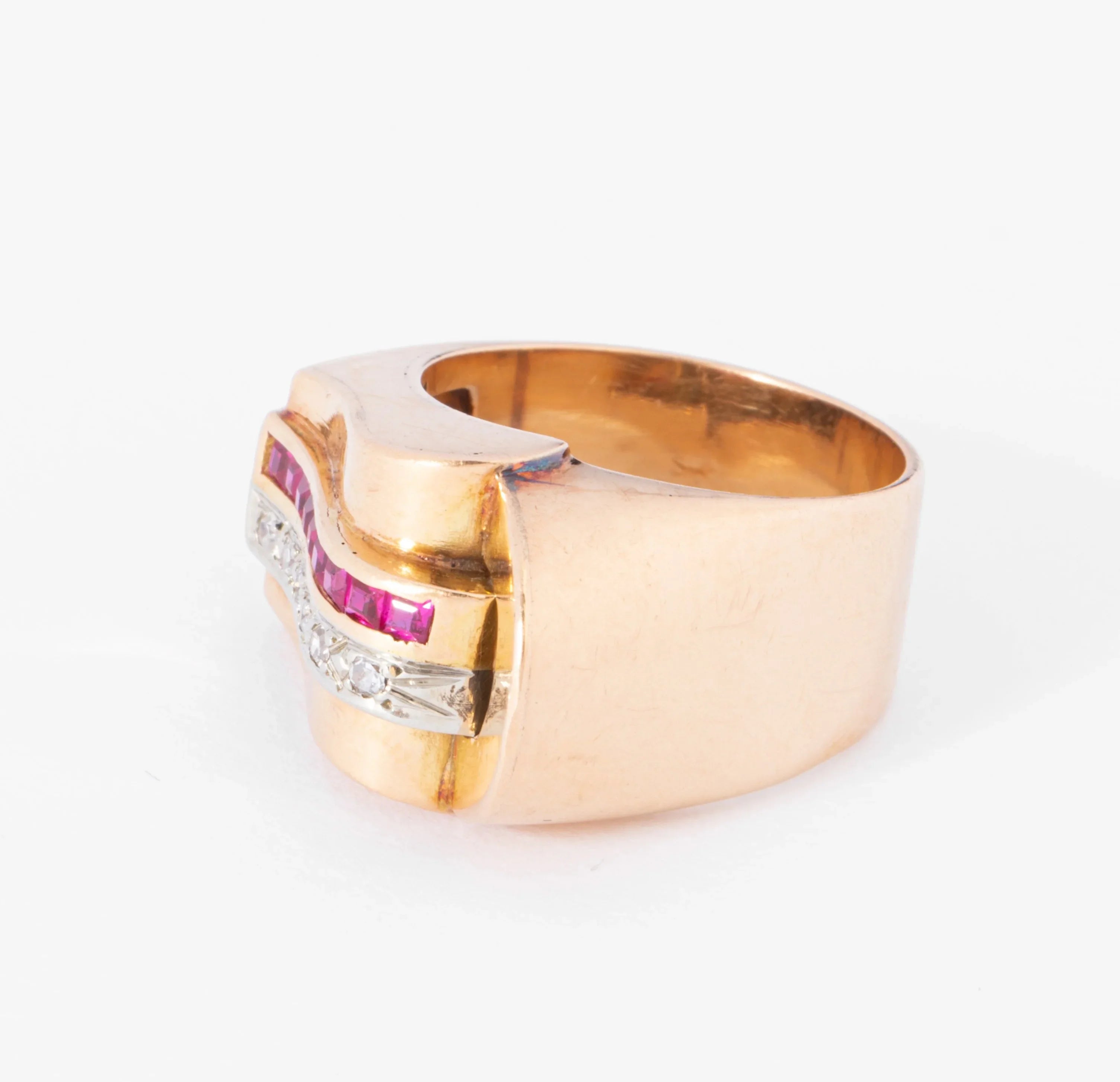 Rose gold tank ring with synthetic diamonds and rubies