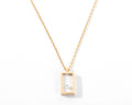 Yellow gold and diamond necklace on Plexiglas by designer Pascal Morabito, Cube model