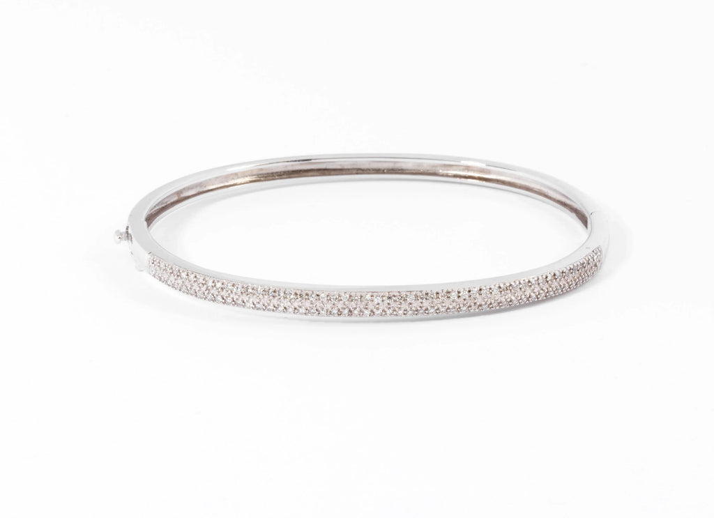 Rigid white gold diamond-set hinged bracelet