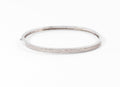 Rigid white gold diamond-set hinged bracelet