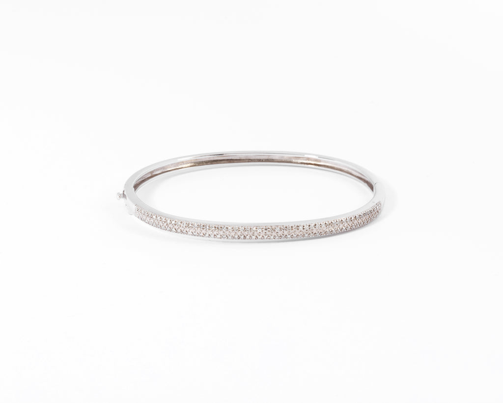 Rigid white gold diamond-set hinged bracelet