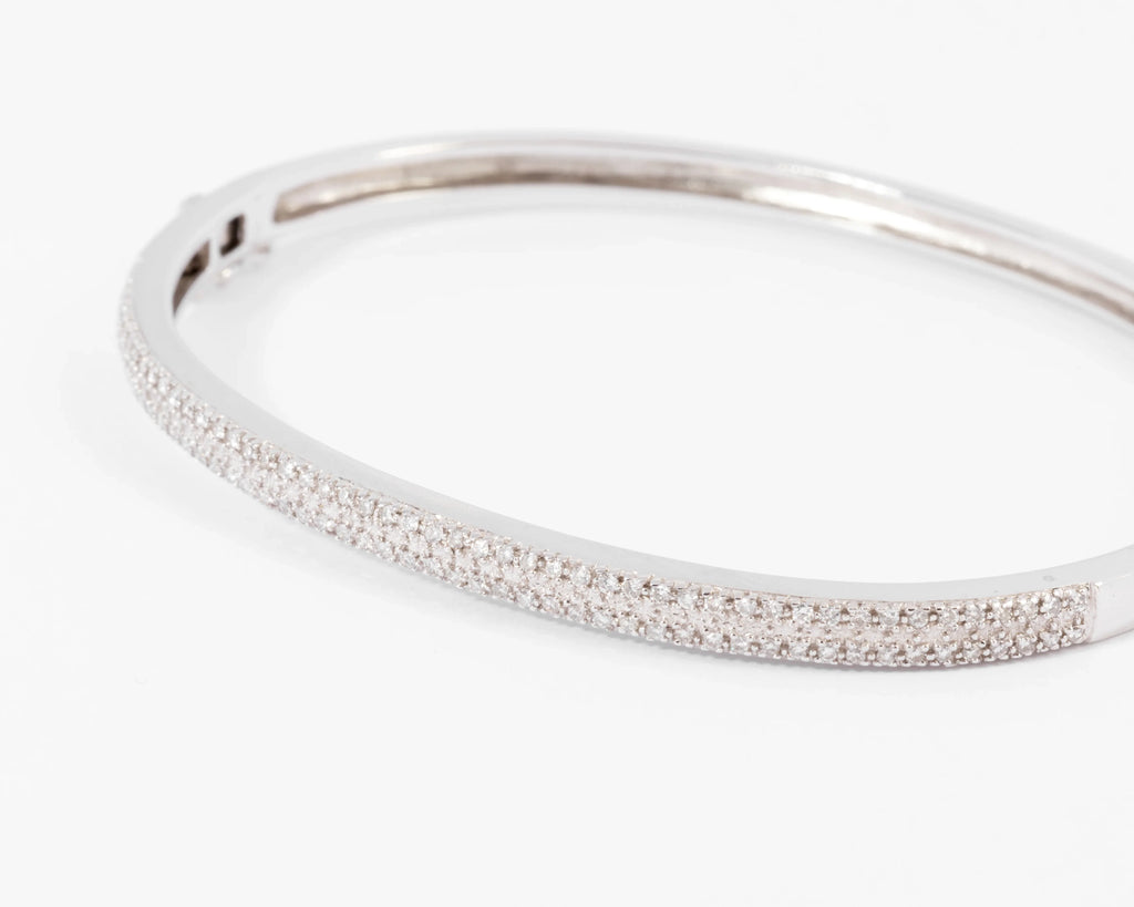 Rigid white gold diamond-set hinged bracelet