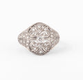 Carved gray gold and diamond dome ring