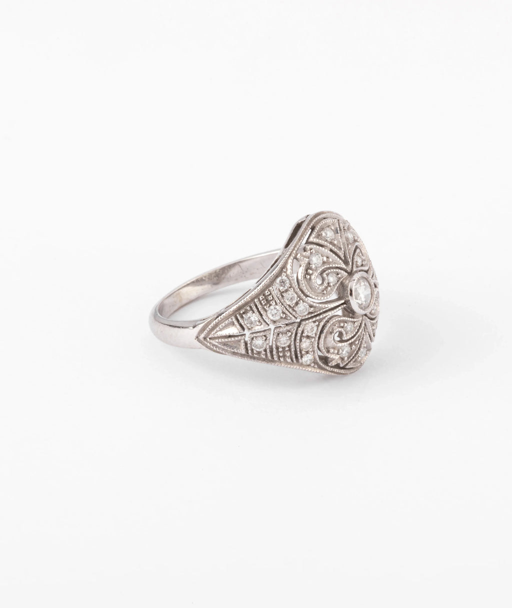 Carved gray gold and diamond dome ring