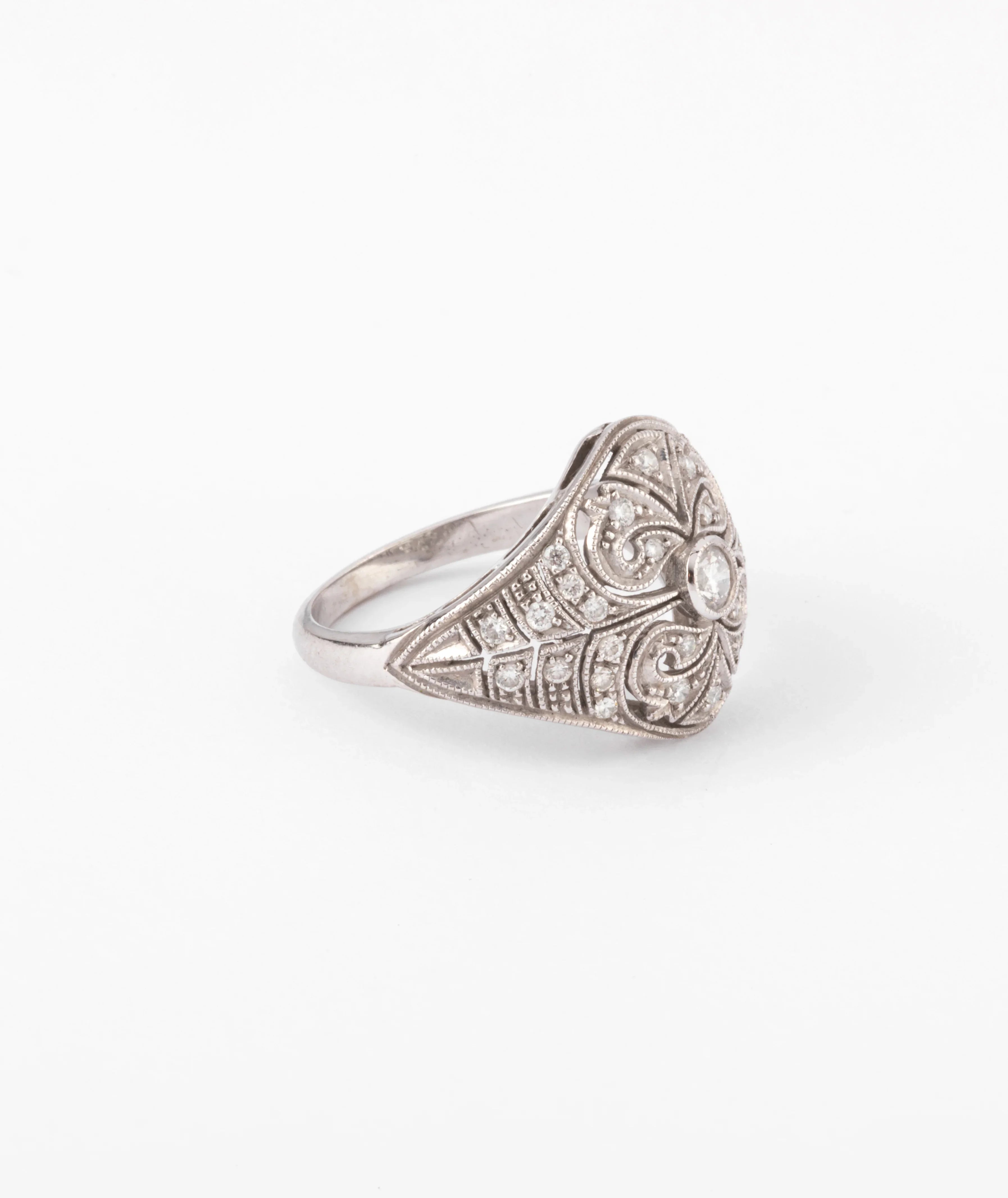 Carved gray gold and diamond dome ring