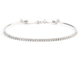 Half-bangle bracelet in white gold with diamond on top