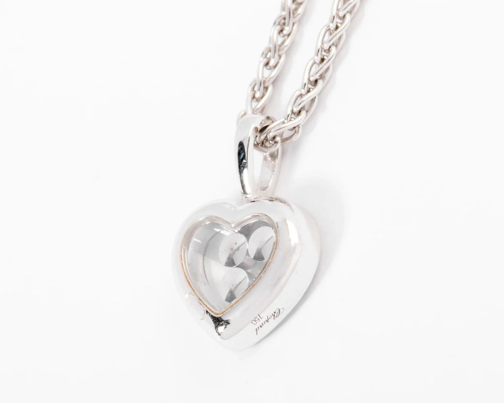 Un pendentif or gris signé de la maison Chopard